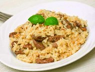 Рецепта Пържени / задушени пилешки дробчета с ориз, къри, лук и сметана на тиган